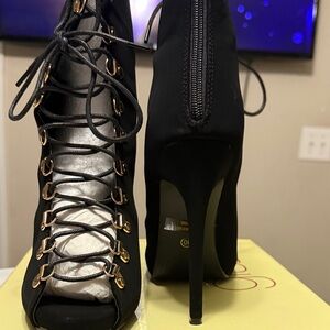 Glaze Black Lace-Up Heels with Gold Accents
